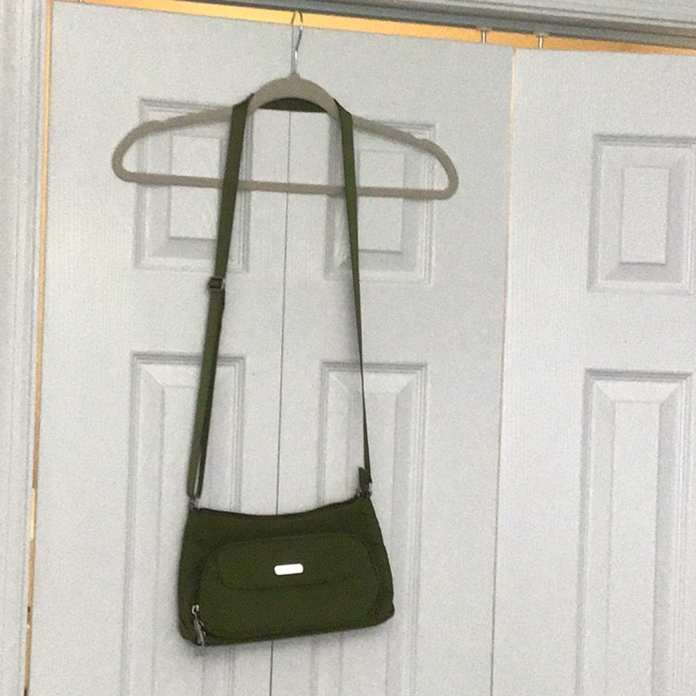 Baggallini crossbody with attached wallet.
